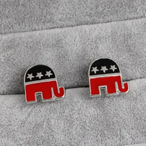 Macro shot of Republican Elephant cufflinks with red and black enamel in a jewelry box
