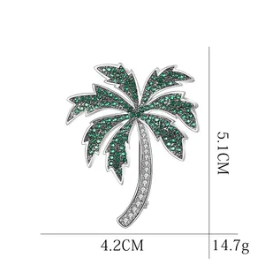 Sparkling palm tree brooch pin with green crystals and silver finish for women suits