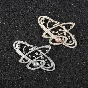 Celestial galaxy brooch with zircon stars and pearls in gold and silver plating