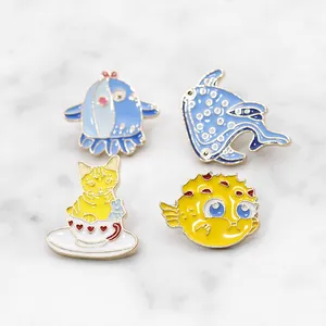 Cute set of 4 cartoon enamel pins featuring whale, shark, jellyfish and cat designs