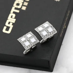 Elegant square silver cufflinks for men featuring white enamel and sparkling rhinestones