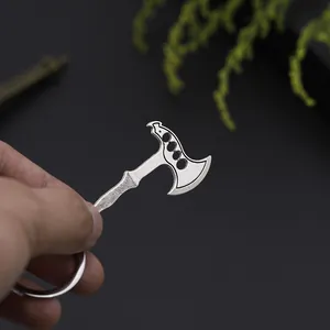 Creative mini metal axe keychain tool with non-slip handle and hollow blade design