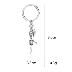 Miniature tool keychain with hammer, screwdriver, and wrench showing 8.6cm height dimensions