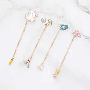 Set of four pastel enamel chain brooches featuring cute rabbit and stationery designs