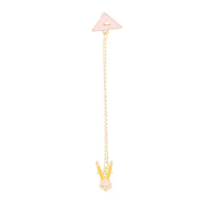 Detailed enamel brooch featuring a pink triangle ruler and yellow compass with gold chain