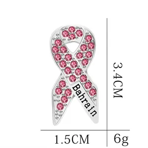 Brosche in Rosa mit Kristallen und Bahrain-Schriftzug, 3,4 cm Höhe und 6g Gewicht