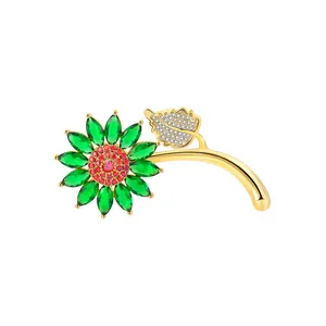 Elegant gold sunflower brooch with green petals, red crystals and diamond leaf