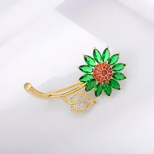 Exquisite sunflower brooch with green marquise stones and gold metal base for women