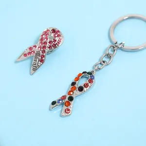 Pink ribbon brooch and colorful rhinestone keychain set with Bahrain engraving