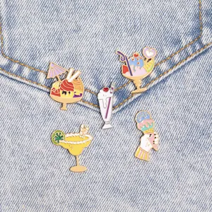 Five-piece set of summer enamel pins featuring colorful ice cream and cocktails on denim fabric