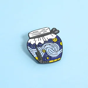 Enamel brooch featuring Van Gogh's Starry Night design in a creative jar shape on blue background
