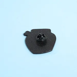 Detail view of Van Gogh Starry Night enamel pin back with black rubber clutch and texture