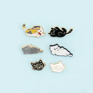 Detail view showing six cute enamel cat pins with Cat Lady text and gold plating