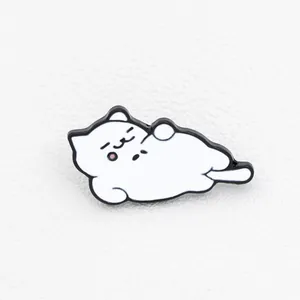 Detailed close-up of a cute white enamel cat brooch with fine zinc alloy finish