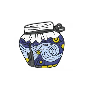 Van Gogh Starry Night enamel pin in a jam jar design with white ribbon on white background