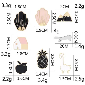 Collection of creative French cartoon enamel pins featuring pineapple and alpaca designs