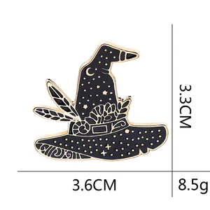 Detailed view of witch hat enamel pin showing dimensions 3.3cm by 3.6cm and 8.5g weight