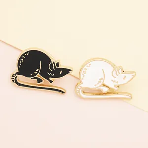 Cute black and white mouse enamel brooches with golden plating on pastel background