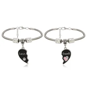 Silver Best Friends heart puzzle necklaces set with black enamel and pink accents