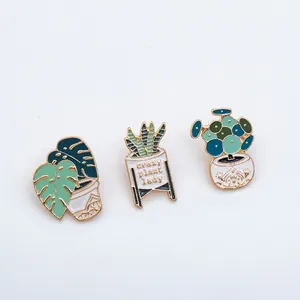 Three-piece cartoon potted plant enamel pins set with Monstera and cactus designs