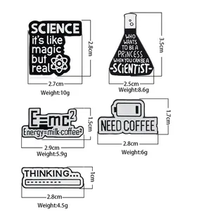 Set of 5 black and white science enamel pins with atom flask and coffee cup designs