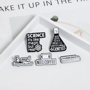 Detailed view of 5-piece monochrome enamel pins set with science and coffee motifs