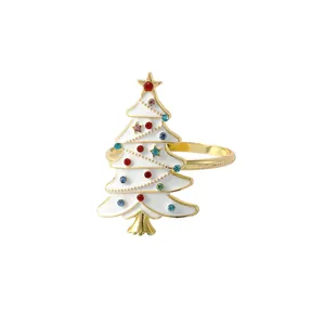 White Christmas tree napkin ring with golden base and multicolored crystal accents