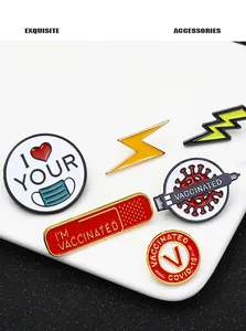 Detailed macro view of zinc alloy enamel pins featuring assorted pandemic prevention themes