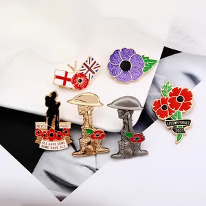 Poppy flower enamel brooch pins with Union Jack and Lest We Forget engraving for memorial