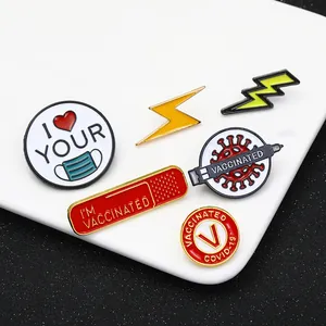 Set of 6 pandemic-themed enamel pins featuring syringes and vaccinated badges