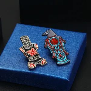 Enamel pins set featuring black knight armor and raven bird in fantasy style