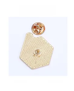 Detailed back view of enamel pin with gold plating, butterfly clutch and textured finish