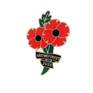 Poppy flower brooch with Lest We Forget ribbon and 2025 year in gold metal finish