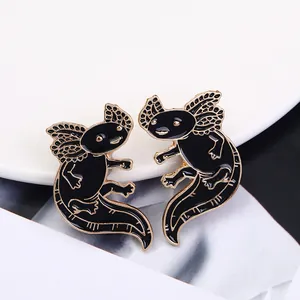 Minimalist black and gold enamel axolotl pins set with cute cartoon dinosaur design