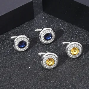 Klassische silberne Manschettenknöpfe mit blauen und gelben Kristallen und Zirkonia-Halo