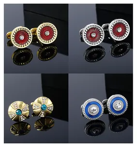 Macro view of crystal zircon cufflinks with vintage patterns and colorful enamel finishes