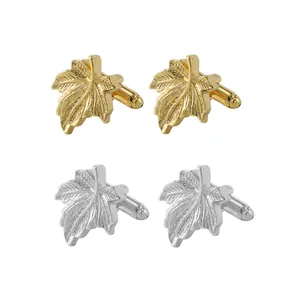 Vintage maple leaf cufflinks set in gold and silver finish with detailed leaf veins