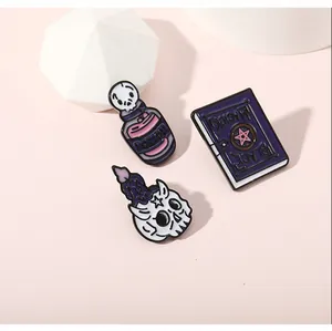 Detailed macro of 3-piece gothic witch enamel pins set with potions and magic book