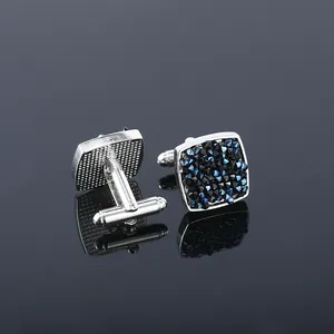 Square silver cufflinks for men featuring brilliant deep blue crystals for business suits