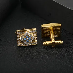 Elegant gold square cufflinks with blue crystals and diamond pave for business shirts