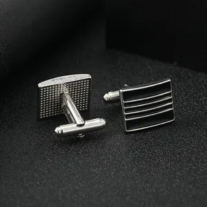 Business cufflinks in black lacquer and silver polished metal with parallel stripe design