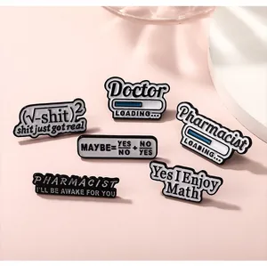 Detail view of medical and math enamel pins including Doctor and Yes I Enjoy Math designs