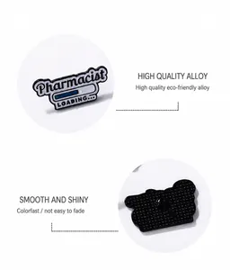 Macro detail of Pharmacist LOADING enamel pin showing metal texture and back clasp