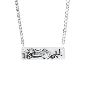 Engraved silver bar necklace featuring mountain landscape and sun on O-link chain