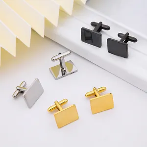 Close-up of three pairs of polished rectangular cufflinks in black, silver, and gold finish
