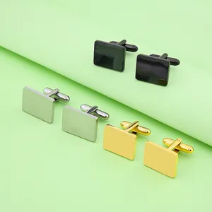Close-up of rectangle cufflinks in black, silver, and gold finish with T-bar closures