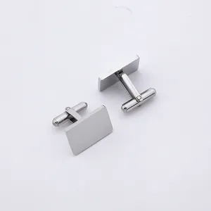 Close-up of polished silver cufflinks with secure bullet back closure for men's shirts