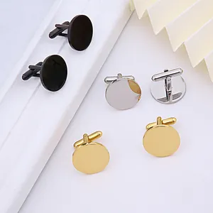 Close-up of polished round stainless steel cufflinks in gold, silver, and black finishes