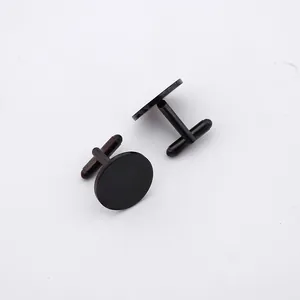 Macro detail of black polished stainless steel shirt cufflinks with T-shaped swivel closure