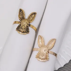 Eleganti portatovaglioli a testa di coniglio in bronzo e oro per decorazioni pasquali